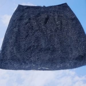 Black floral mini skirt